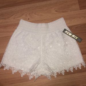 White lace shorts